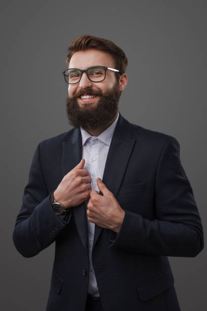 istock Handsome cheerful man wearing suit 1087249108
