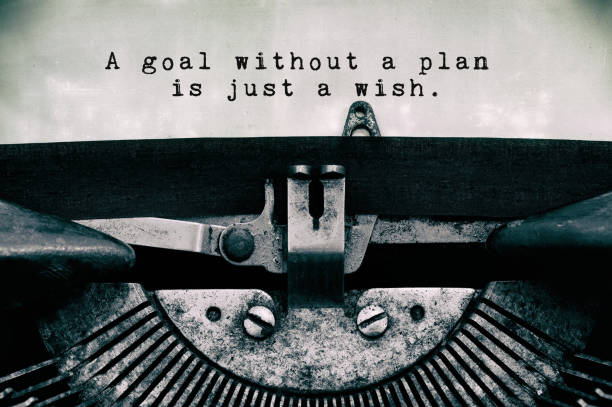 Inspirational Quotes A goal without a plan is just a wish motivations words typed on a vintage typewriter in black and white. typewriter photos stock pictures, royalty-free photos & images