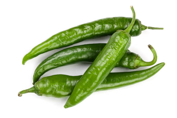 istock green hot chili peppers isolated on white background. Top view. Flat lay pattern 1087256018