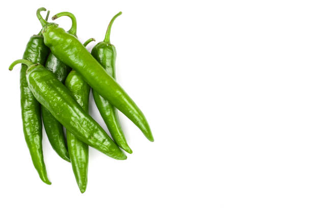 istock green hot chili peppers isolated on white background with copy space for your text. Top view. Flat lay pattern 1087256024
