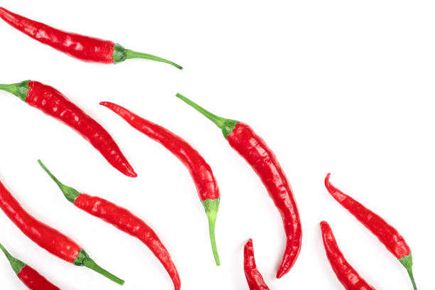 istock red hot chili peppers isolated on white background with copy space for your text. Top view. Flat lay pattern 1087256060