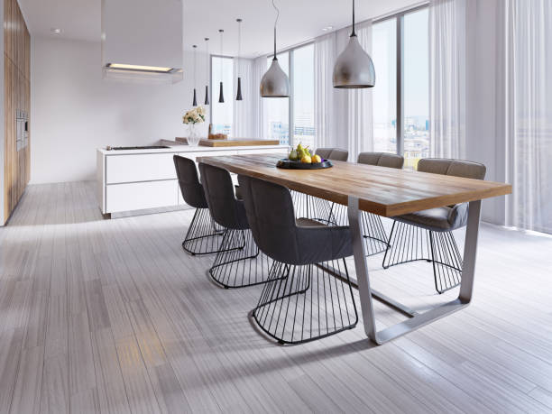 istock Contemporary dining room with large table and loft style chairs. 1087259092