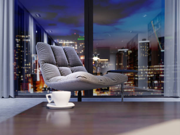 istock Designer soft chair with quilted upholstery in the evening interior. 1087265652