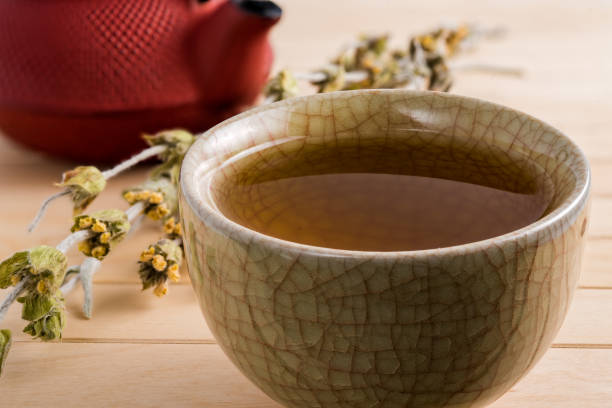 istock Cup of tea and teapot 1087267388