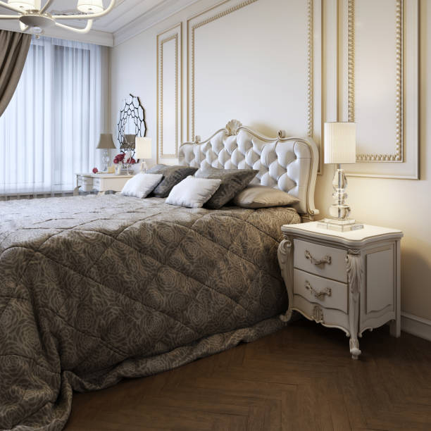 istock King-size bed in bright bedroom with big window. 1087268152