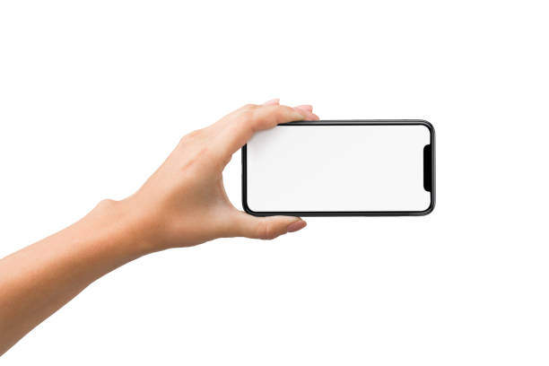 Woman hand holding smartphone in horizontal orientation