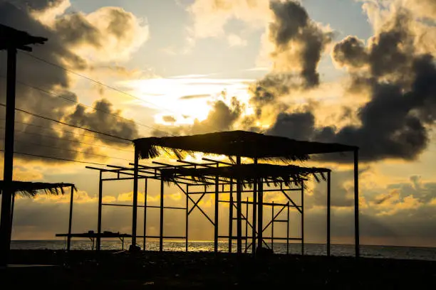 Photo of Beautiful sunset above the Black sea looking from the beach in B