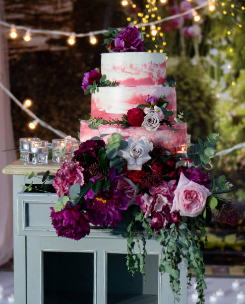 istock Red festive cake with flowers. Wedding cake. 1087275634
