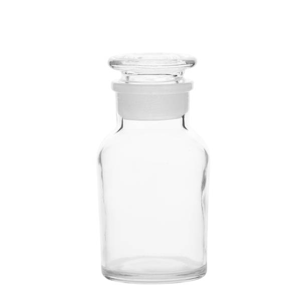 istock empty glass bottle isolated on white, transparent jar 1087275728