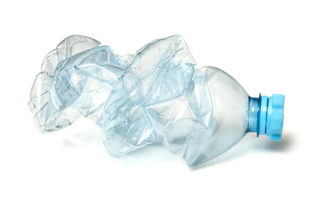 istock plastic bottle crushed for recycling on white background 1087277208