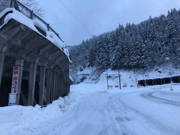 istock snow road gokayama japan 1087278202