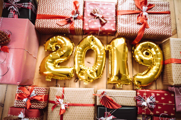 istock christmas present on parquet floor for the new year 2019 1087283328