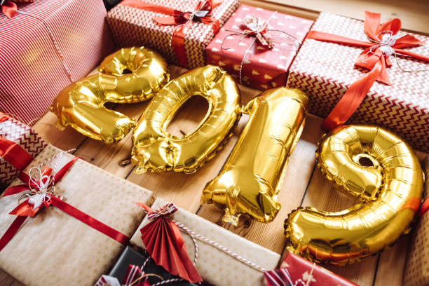 istock christmas present on parquet floor for the new year 2019 1087285072