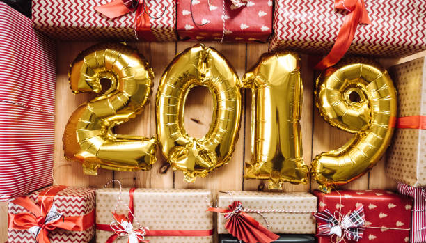 istock christmas present on parquet floor for the new year 2019 1087286534