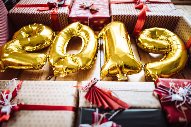istock christmas present on parquet floor for the new year 2019 1087286572