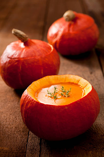 Pumpkin soup with thyme stock photo