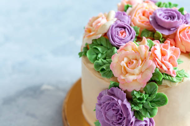 istock Buttercream flower cake close-up. 1087290110