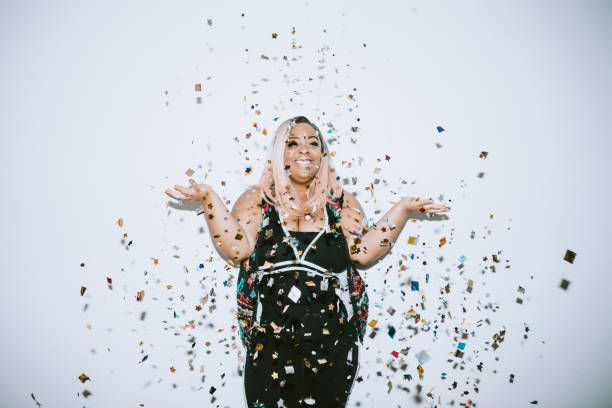 istock Generation Z Young Woman Celebrates With Confetti 1087298786