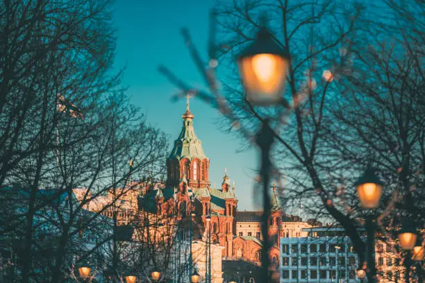 Photo of Helsinki, Finland. Uspenski Cathedral On Hill At Winter Morning. Red Church Is Popular Tourist Destination In Finnish Capital.