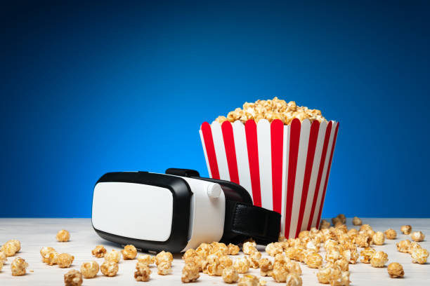 VR headset with basket of popcorn stock photo
