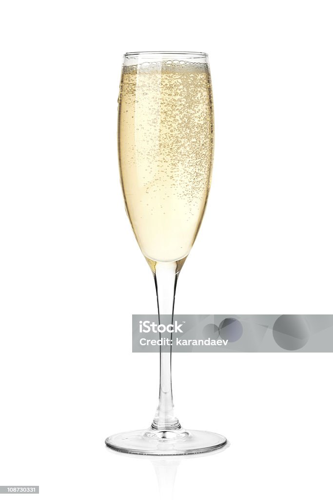 Champagne in a glass Champagne in a glass. Isolated on white background Champagne Stock Photo