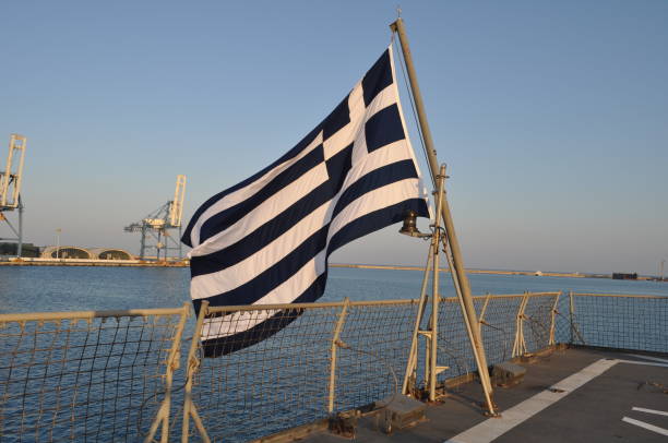 istock Greece and Cyprus flag on flagpole 1087307716