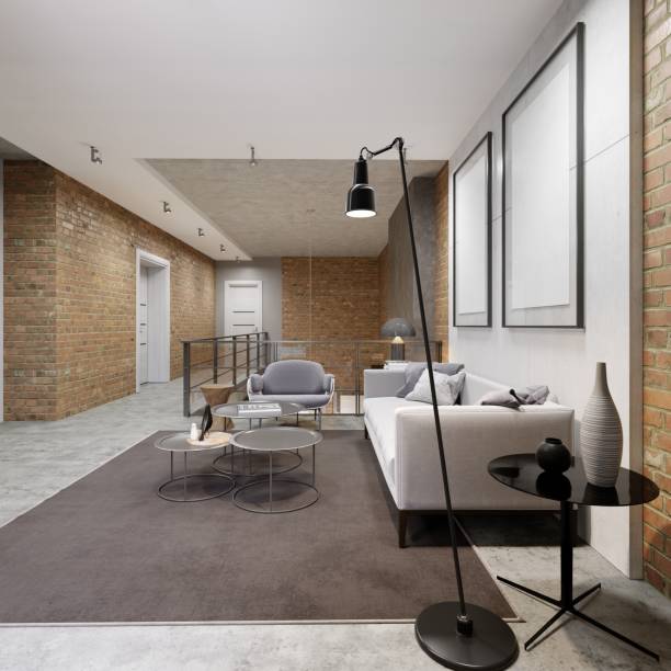 istock Spacious modern open-plan loft living room with  comfortable grey couches in seating areas. 1087308120