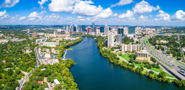 istock Austin Texas Puffy Clouds on a Summer Day aerial drone panoramic 1087313364
