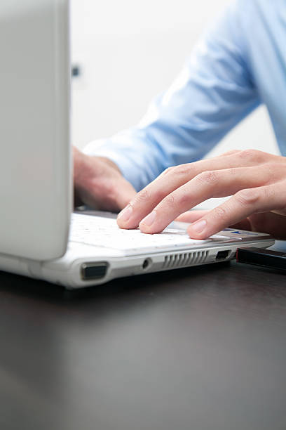 istock Male hands typing on a laptop 108731496