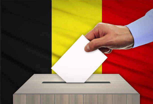 istock Man voting on elections in BELGIUM 1087319926