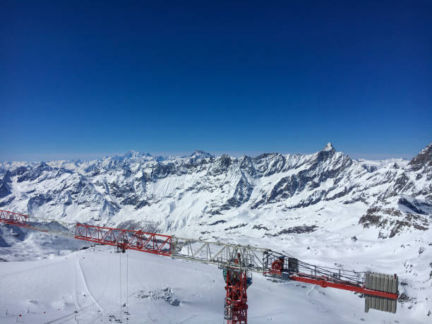 istock Construction crane on top of Klein Matterhorn mountain 1087324592