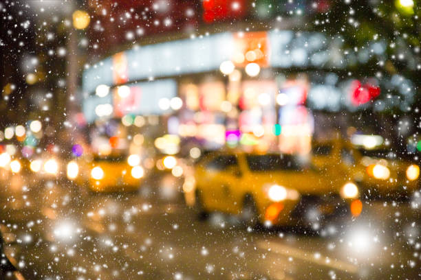 new york city blur with snow - taxi new york city traffic busy imagens e fotografias de stock