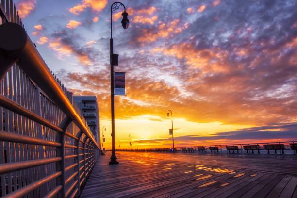 istock Sunrise over the Long Beach Boardwalk 1087330496
