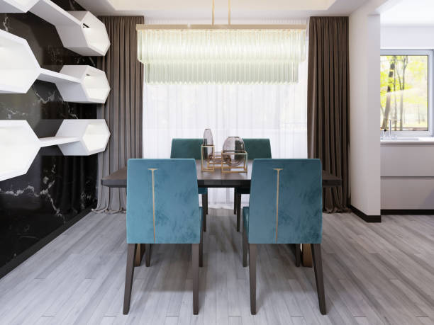 istock Luxury dining table with velor chairs and a massive table on bronze legs with a glass chandelier. 1087332242