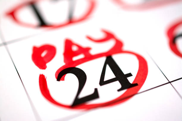 istock Red circle marked with pen on a calendar sheet 1087335344
