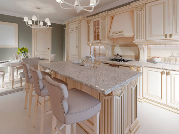 istock Kitchen island in a luxurious classic style kitchen. 1087338380