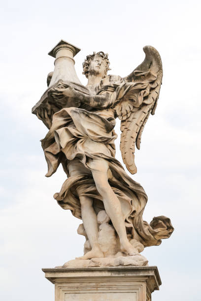 istock Angel with the Column Statue in Hadrian Bridge, Rome, Italy 1087353492