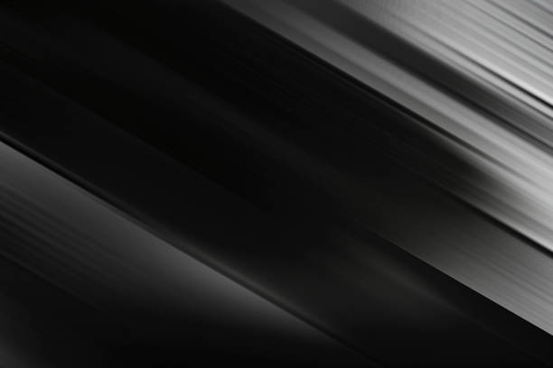 The black and silver backgrounds with white the light gradient is the diagonal.