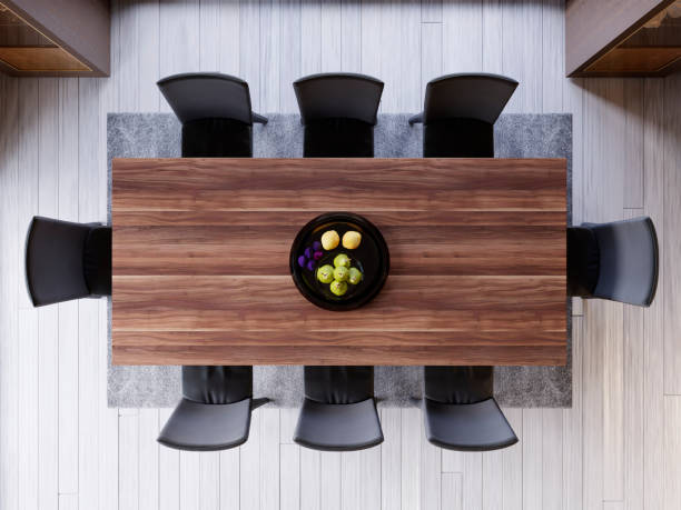 istock top view over dining table in dining room. ceramic dish decoration on wood and wooden table. soft light color. set of dinner room. little fruit decoration. 1087357668