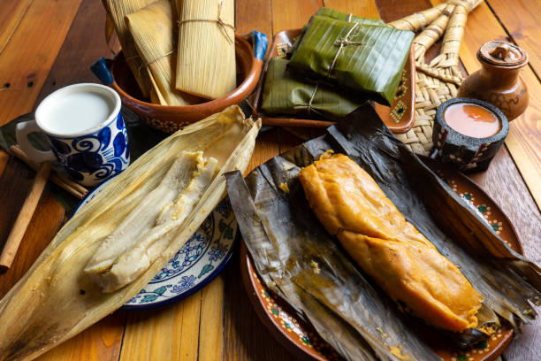 istock Mexican tamal in banana and corn leaf 1087362912