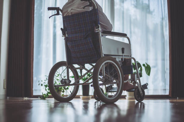 istock Wheelchair and woman 1087362978