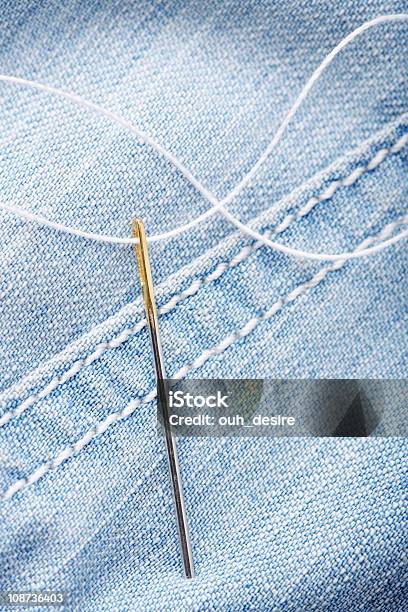 Needle With Thread On Jeans Material Stock Photo - Download Image Now - Art And Craft, Casual Clothing, Close-up