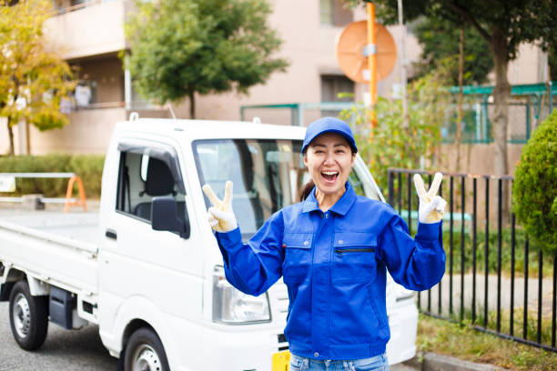 istock Asian women and light trucks 1087371400