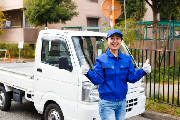 istock Asian women and light trucks 1087371438