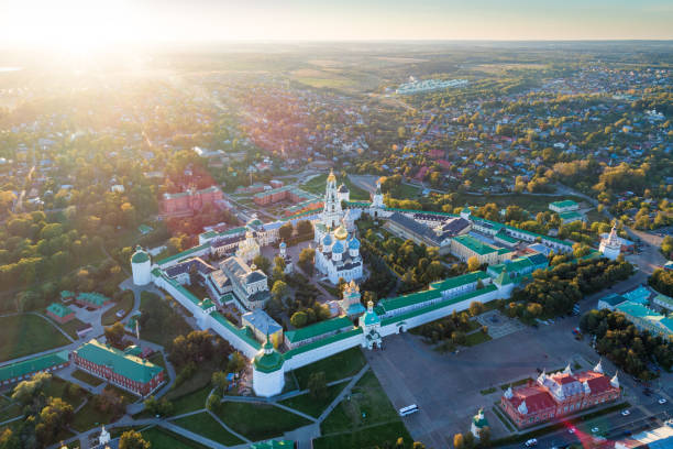 Panoramic aerial view on Russian Orthodox monastery Panoramic aerial view on Trinity St. Sergy Monastery at autumn sunset. Sergiev Posad, Russia golden ring of russia photos stock pictures, royalty-free photos & images