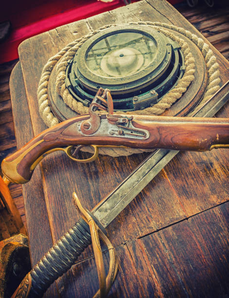 istock Pirate weapons on an old ship. Artistic photo toning 1087384144