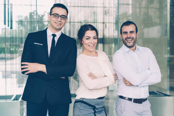 istock Successful confident business people smiling at camera 1087397820