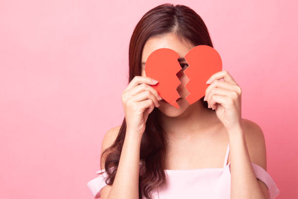 istock Happy young Asian woman with a blank card. 1087428706