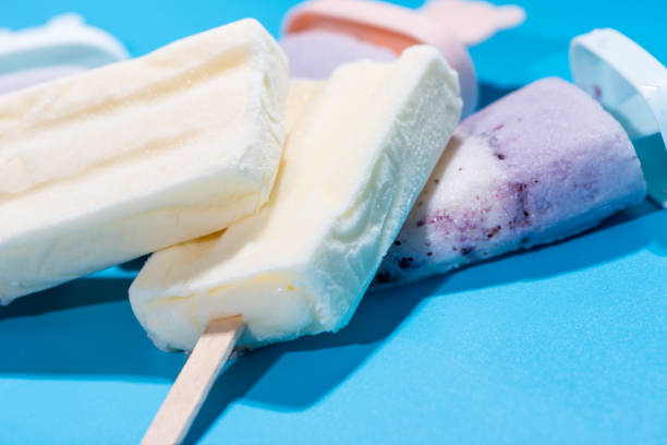 istock Milk popsicle and Blueberry popsicle 1087441518