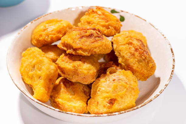 istock Chicken nuggets on a China plate 1087442128